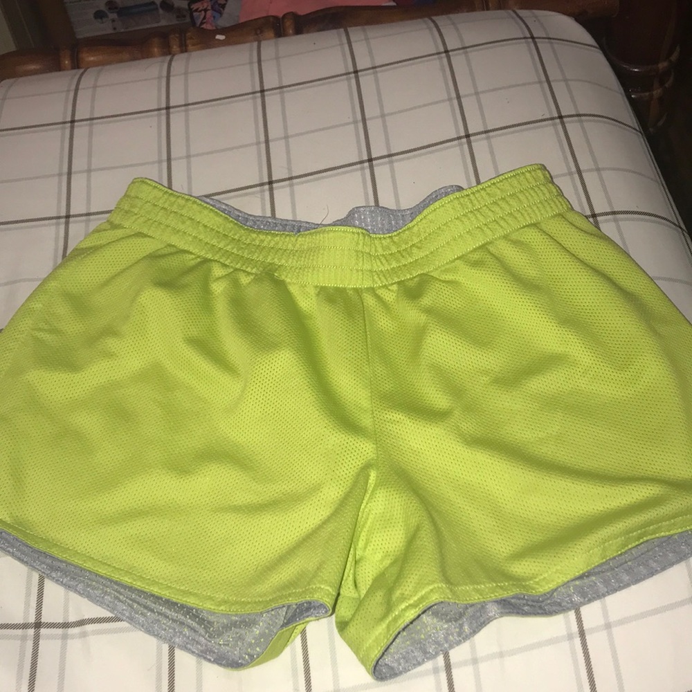 Green athletic shorts